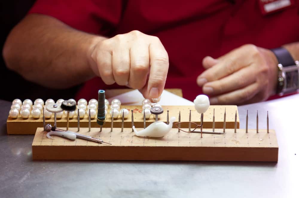 Man making cruelty-free Majorica pearls